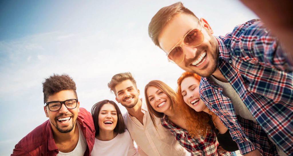 A group of friends hanging outside.