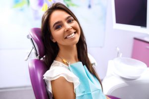 woman smiling in dental chair