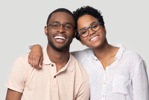 african-american man and woman smiling
