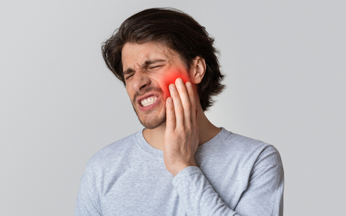 man with a tooth infection