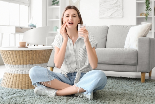 woman with tooth sensitivity
