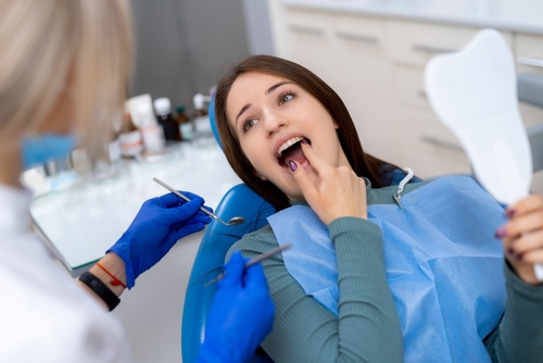 Dental,Checkup,With,A,Happy,Patient.,A,Young,Woman