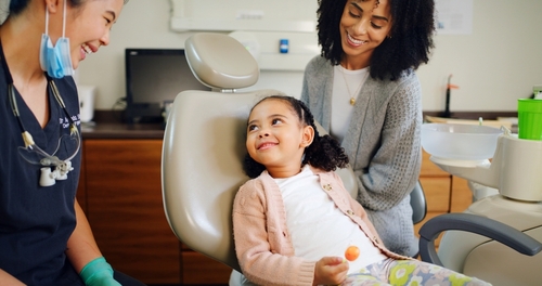 Smile,,Kid,And,Consultation,With,Dentist,In,Office